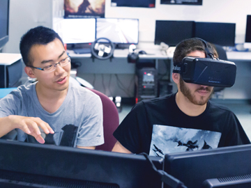 students in computer lab wearing vr headset