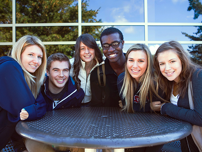 students sitting at table