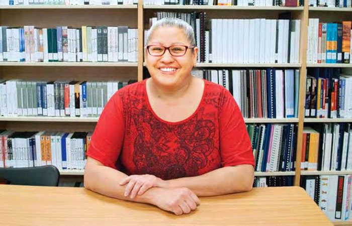 staff smiling in library