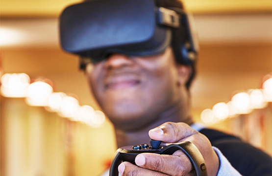 student headshot using virtual reality glasses