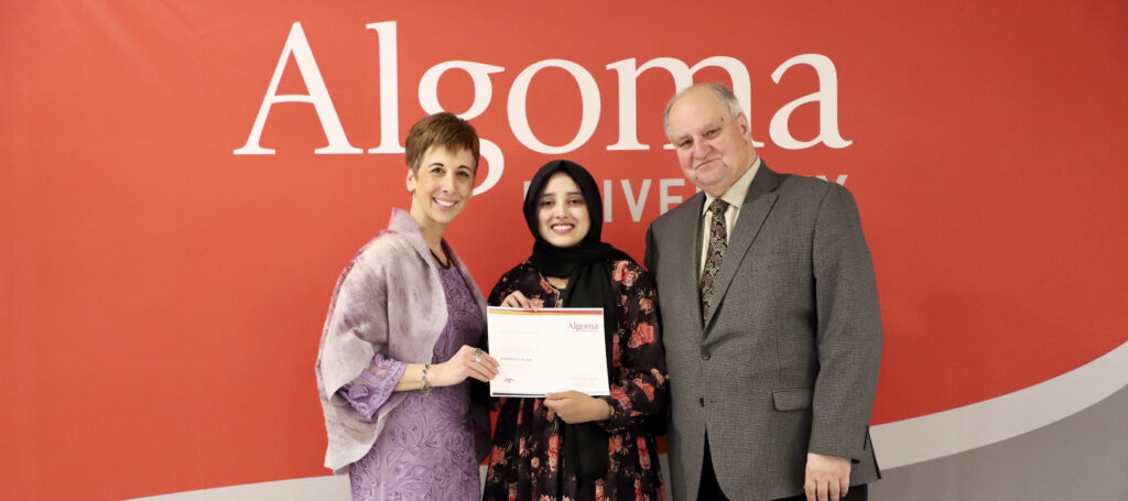 Student receiving award