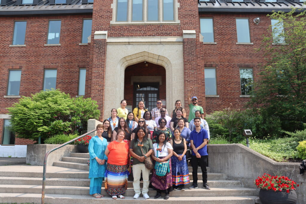 Group shot on the steps of Shingwuak Hall