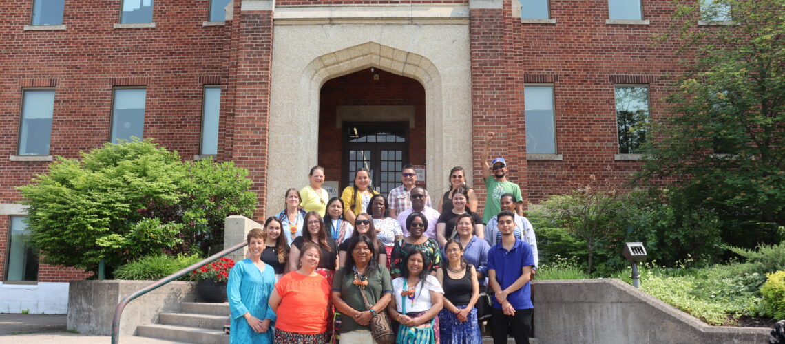 Group shot on the steps of Shingwuak Hall