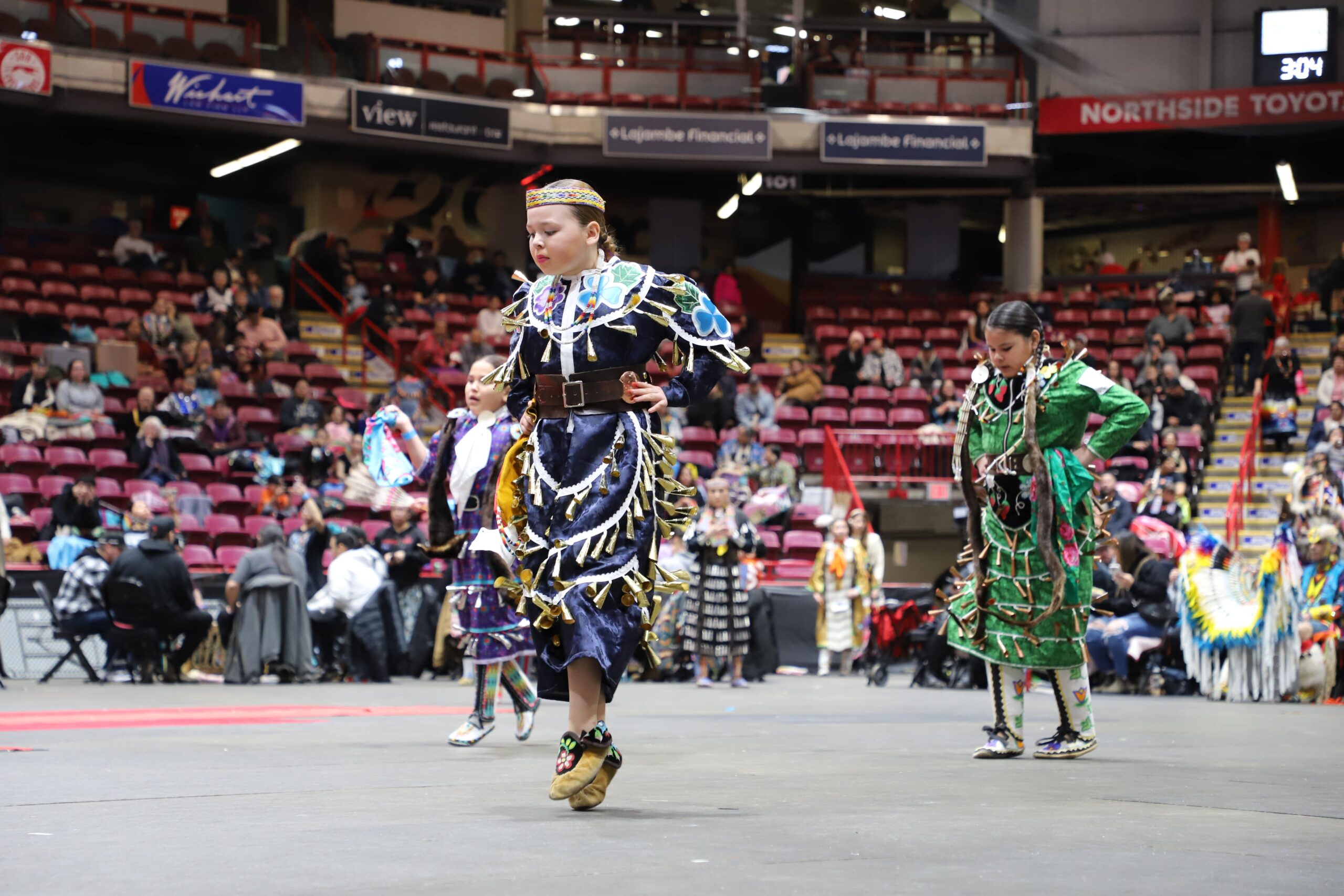 Participants performing at Pow Wow