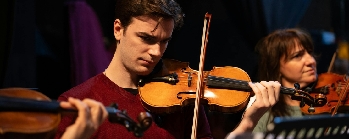 Student playing the violin