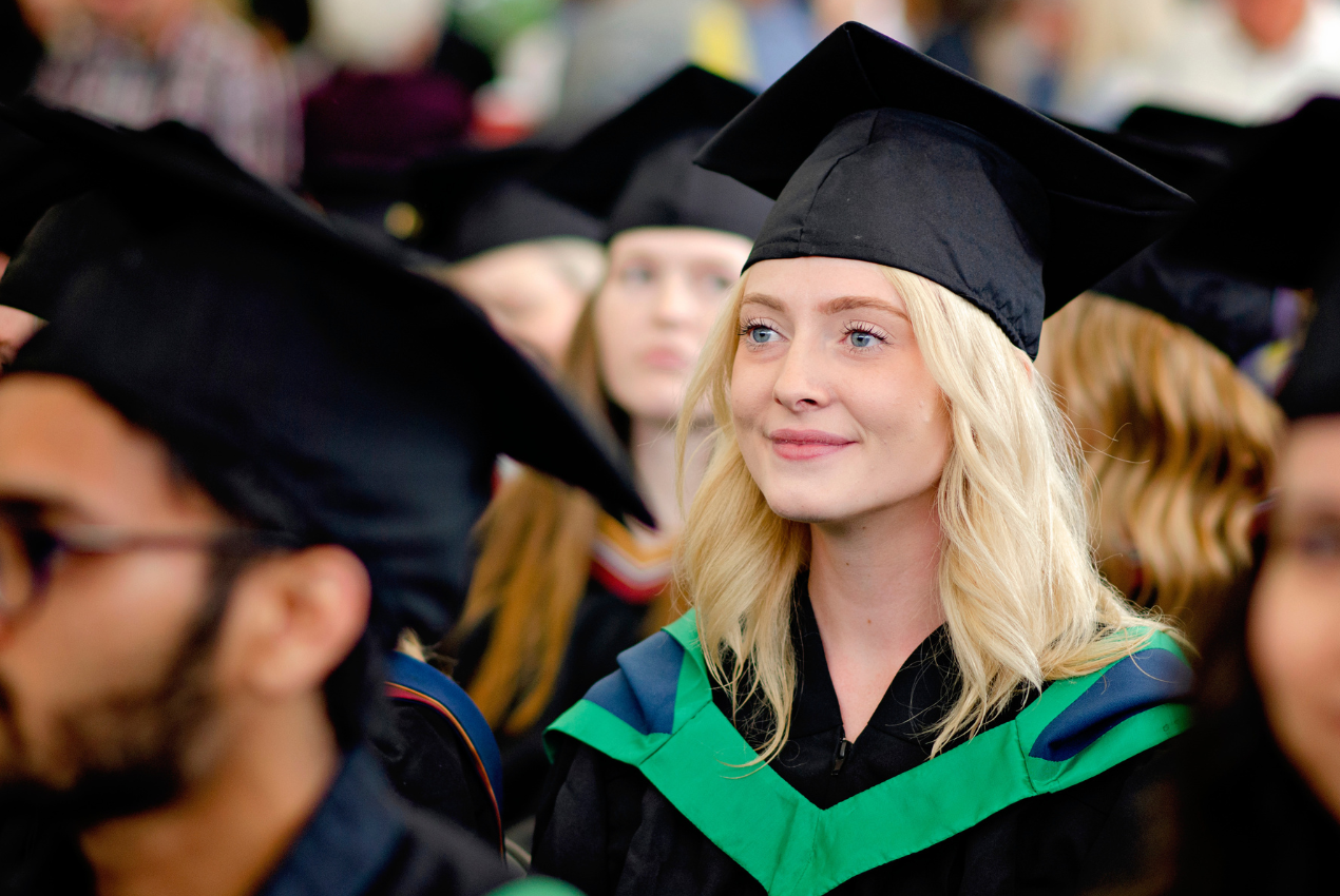 graduate smiling